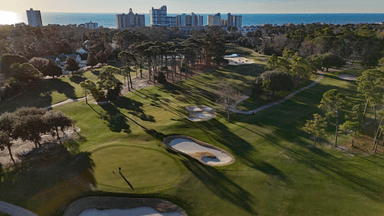 Pine Lakes 18th Green and Ocean